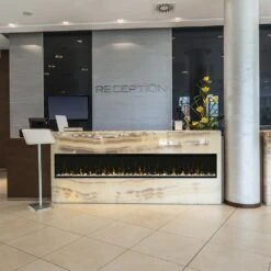 Dimplex 100 In. IgniteXL LED Built-In Linear Electric Fireplace - Multi-Fire XD Flame Technology - 1,000 SQ FT -electric fireplace Store Dimplex XLF100 Black Glass Media White Embers Orange Flames Reception Area a7798a00 74df 40ad a681 baa1ca61aea3